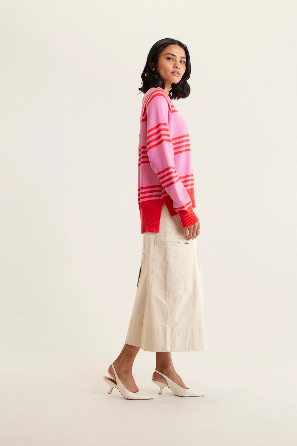 woman wearing Cascade Cotton Knit Sweater - Lolly and beige skirt