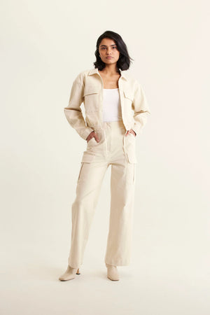 woman wearing white top, Whitney Cotton Drill Pant - Pebble and outer jacket in pebble