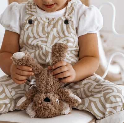 Toddler holding Wilbur Koala