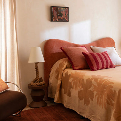 Bedroom with Orange, White and Boucle Stripe Burgundy 60x40cm Cushion placed on the bed