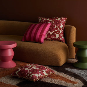Sofa with Bold Stripe Raspberry and Pink Floral Cushion