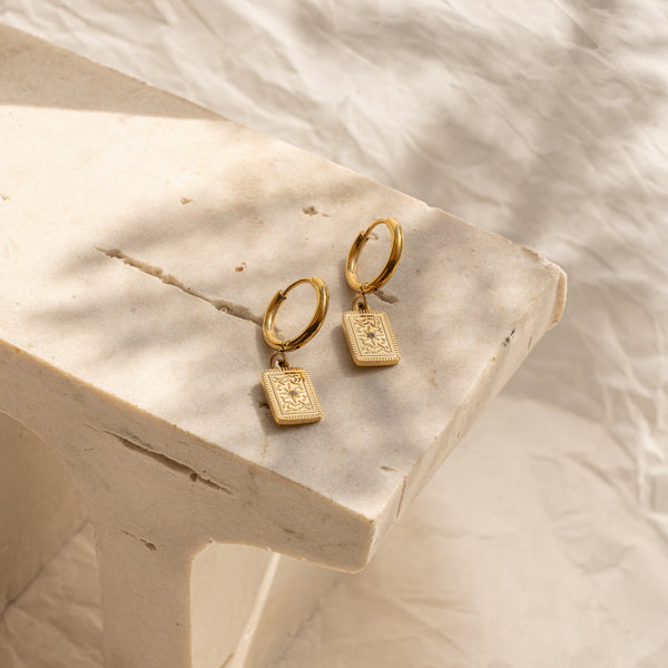faya-co-elsa-sun-huggie-earrings