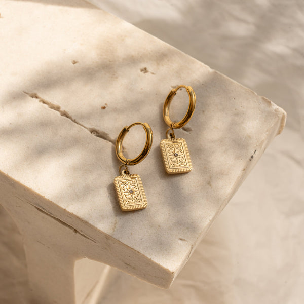 faya-co-elsa-sun-huggie-earrings