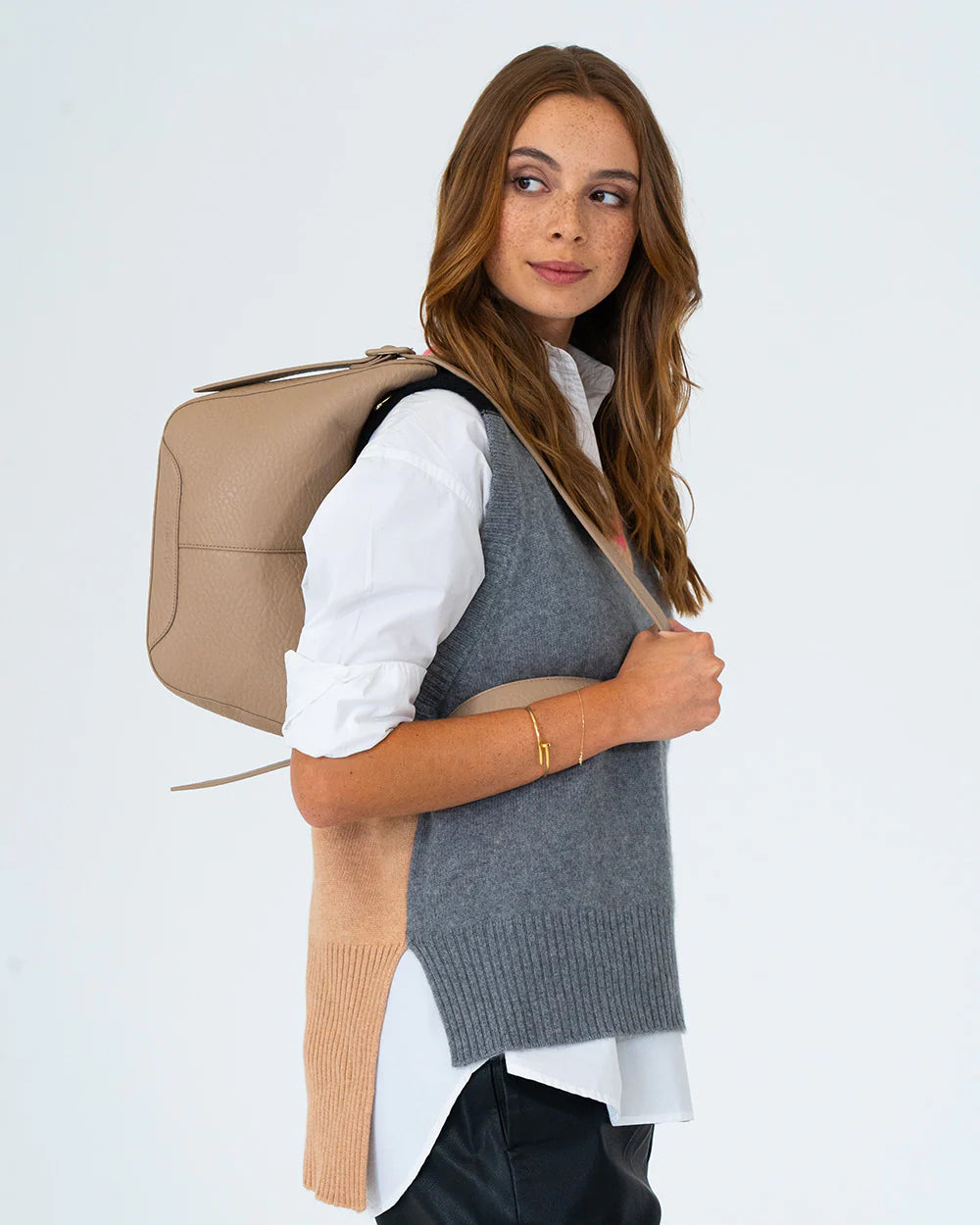 woman using Barton Shoulder Bag - Latte