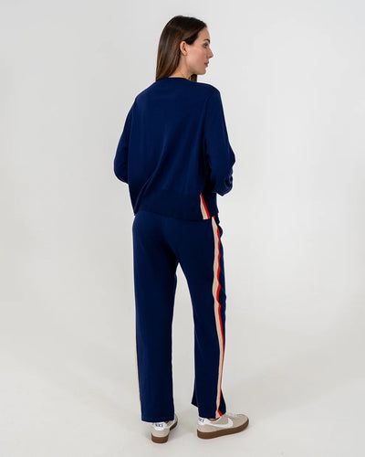 Woman wearing Blake Lounge Pants and Long sleeve Knit in Navy back view