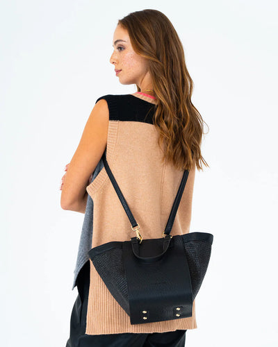 Woman using Carnegie Tote - Black