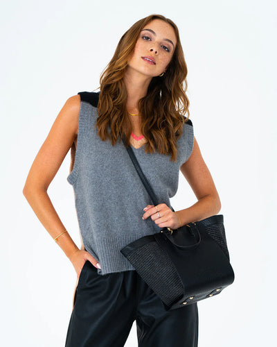 Woman using Carnegie Tote - Black