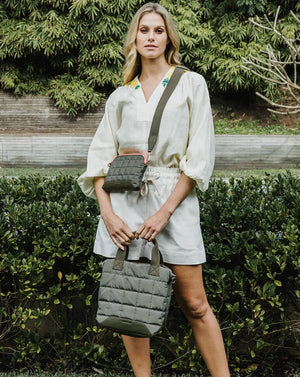 Woman holding Mini Santa Monica Tote with strap Khaki