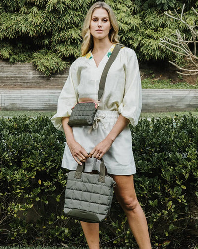 Woman holding Mini Santa Monica Tote with strap Khaki