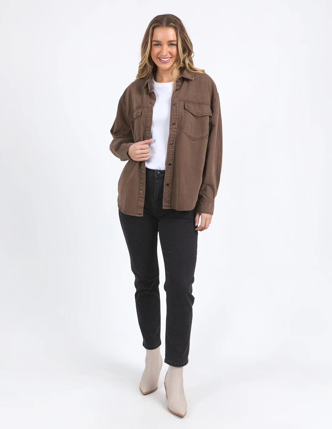 Full image of woman wearing white top and black pants with Daisy Overshirt - Chocolate