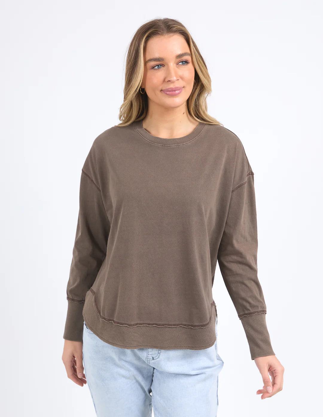 Woman wearing Farrah Long Sleeve - Coffee Quartz and light denim pants
