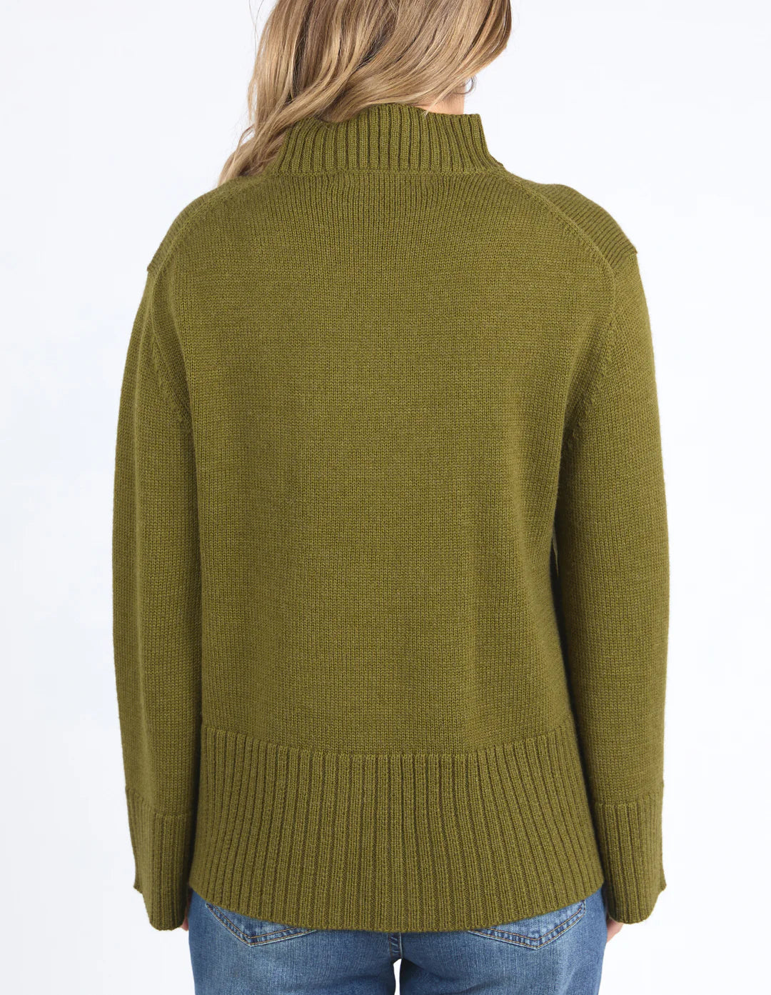 Woman facing the back Jude Knit in Olive Green