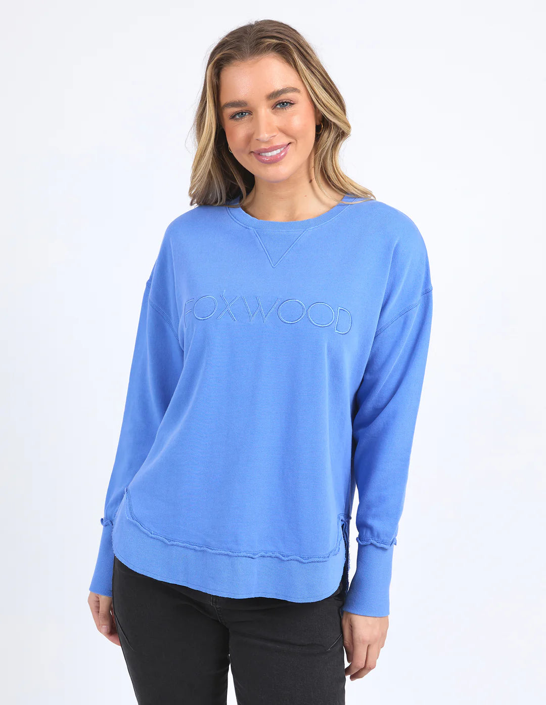 Woman wearing Simplified Crew - Cobalt and black pants