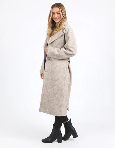 Woman slightly facing the side wearing Whistler Coat - Oat