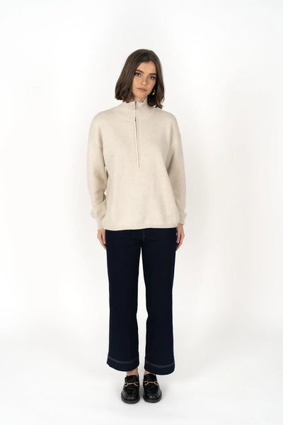Woman wearing Knox Zip Sweater - Almond and black pants