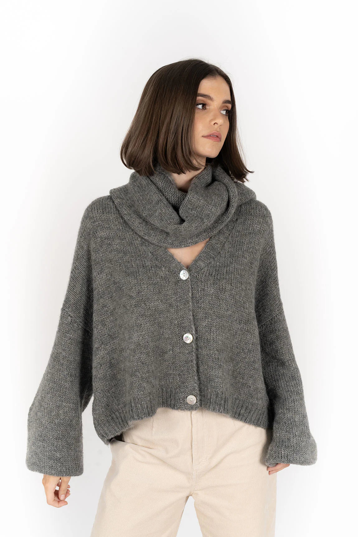 woman wearing Zia Jumper - Grey, grey scarf and pebble pants