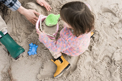 toddler playing in the sand with Bobbi Kids - Mustard Yellow/Black