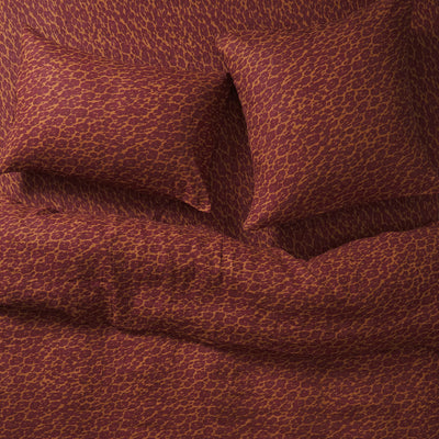 Bed with Odette print pillowcase and bed cover
