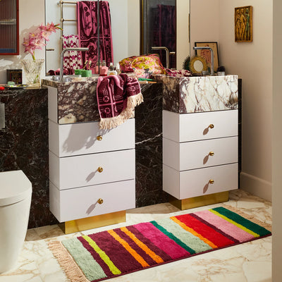 bathroom with towel and Corinne Bath Runner