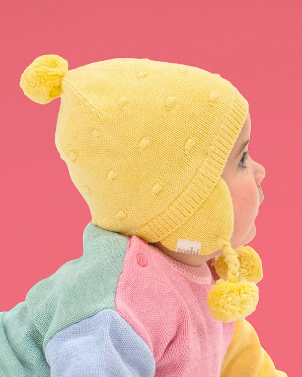 toddler wearing Organic Earmuff Popcorn - Banana