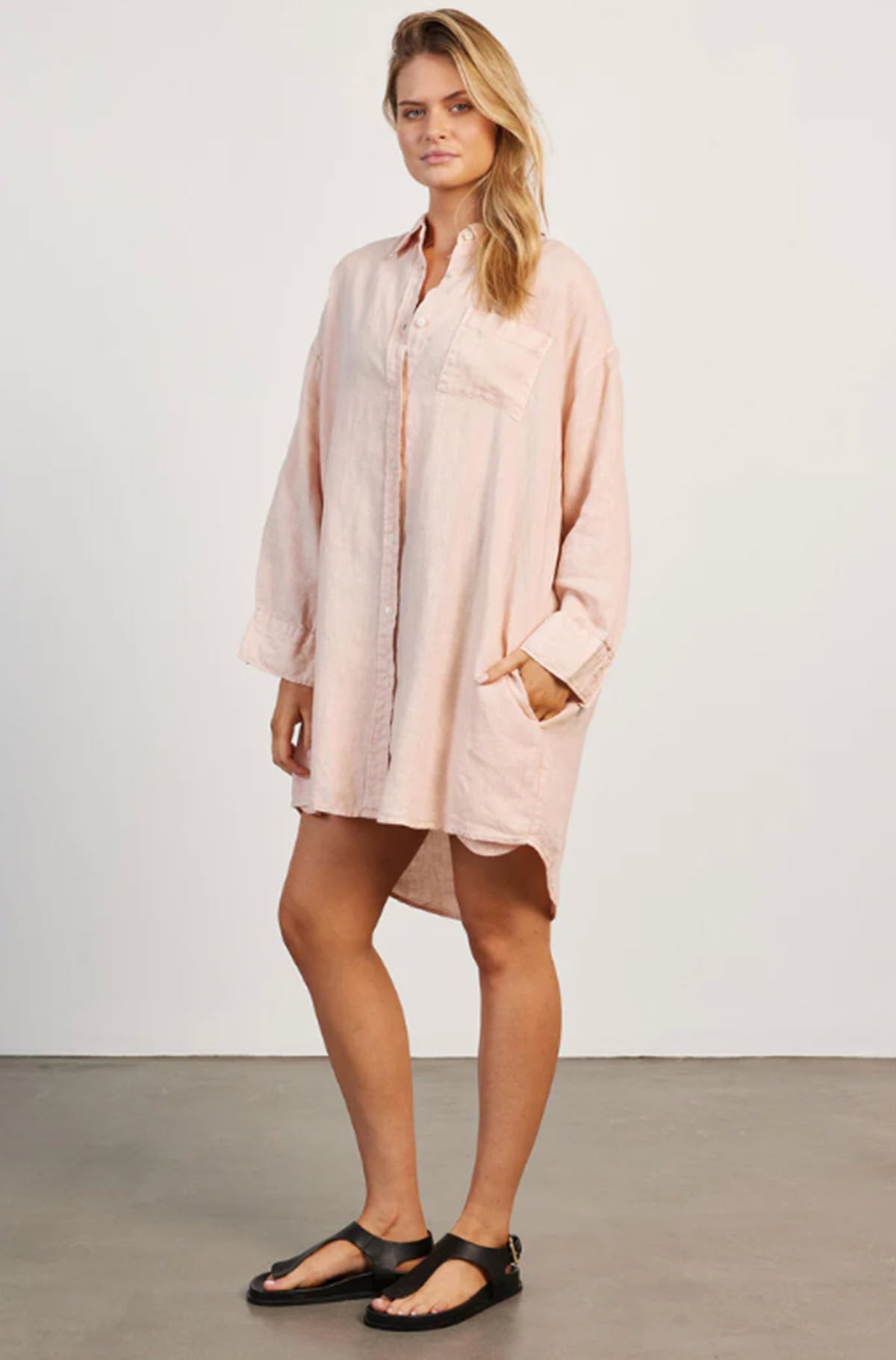 woman wearing Hampton Linen Beach Dress - Peach side view