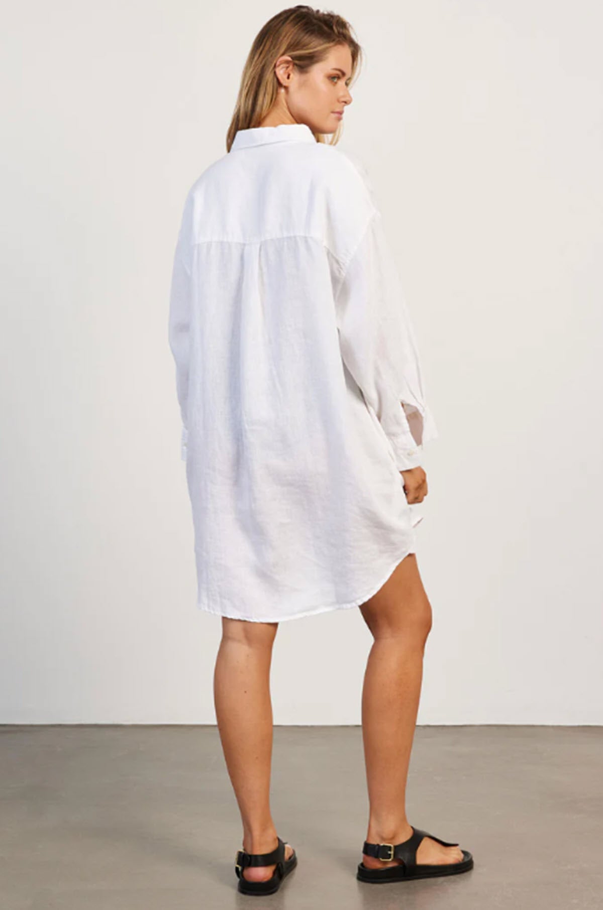 Woman wearing Hampton Linen Beach Dress - White back side