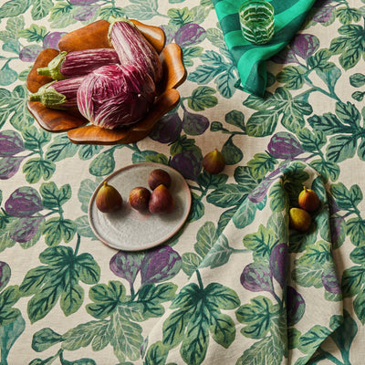 figgy green tea towel with figgy in the table