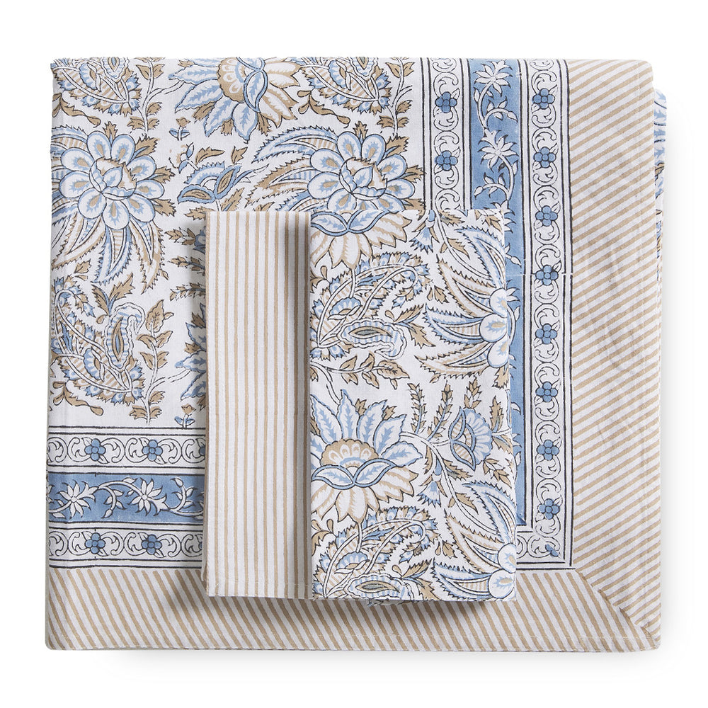 canvas and sasson folded bromley 4 set napkin in cornflower design  features a striking, ornate floral design in tones of blue and taupe on a white cotton base