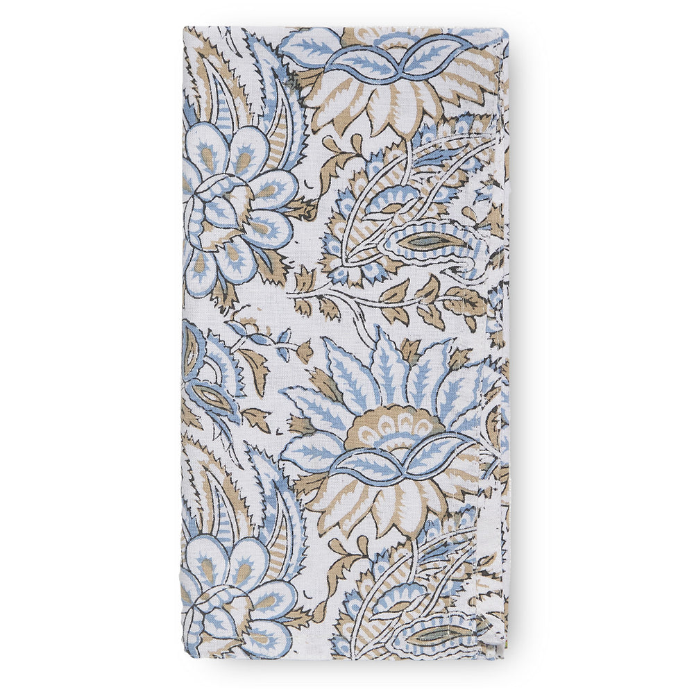 canvas and sasson folded bromley 4 set napkin in cornflower design  features a striking, ornate floral design in tones of blue and taupe on a white cotton base
