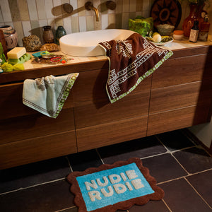sage-x-clare-romy-nudie-bath-mat-mini-turquoise