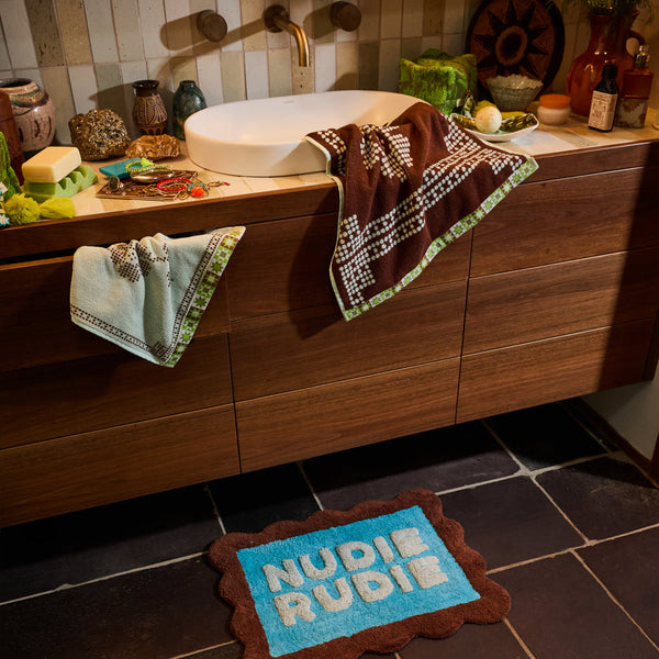 sage-x-clare-romy-nudie-bath-mat-mini-turquoise