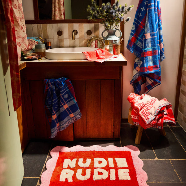sage-x-clare-romy-nudie-bath-mat-poppy