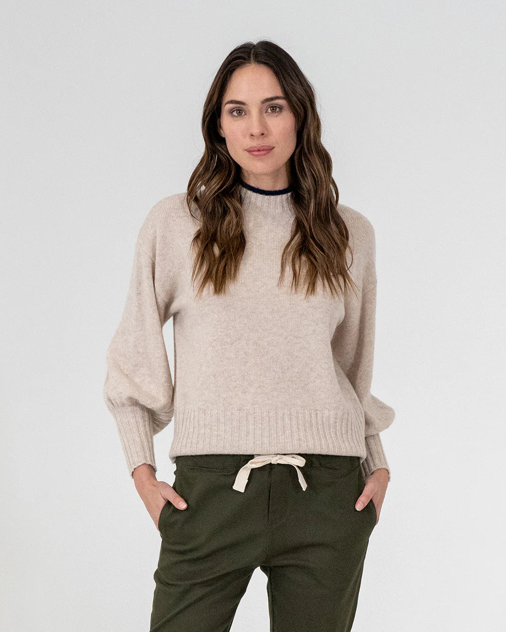 woman wearing Steward Knit - Oatmeal and khaki bottoms