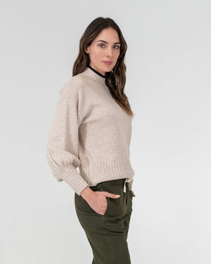 woman wearing Steward Knit - Oatmeal and khaki bottoms