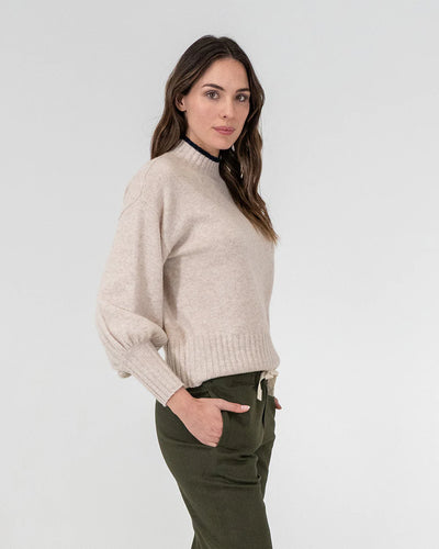 woman wearing Steward Knit - Oatmeal and khaki bottoms