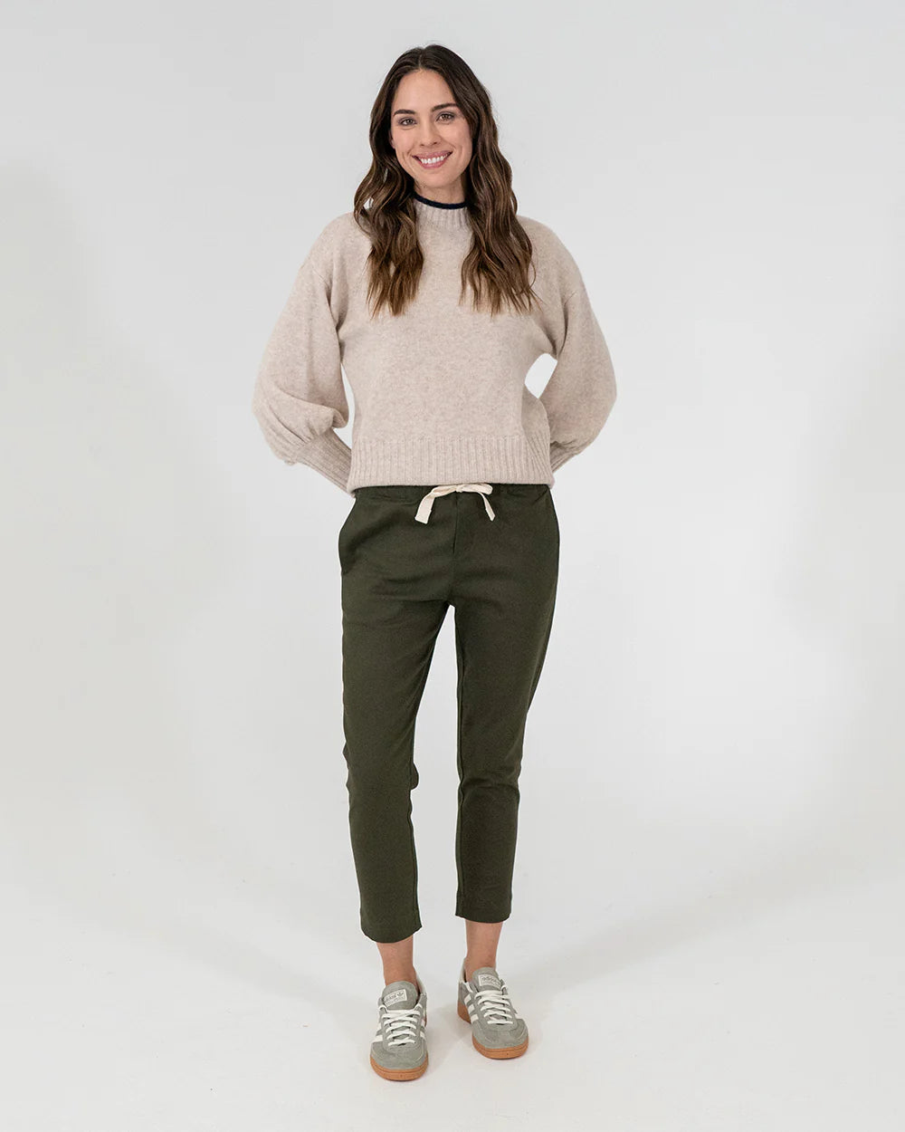 woman wearing Steward Knit - Oatmeal and khaki bottoms