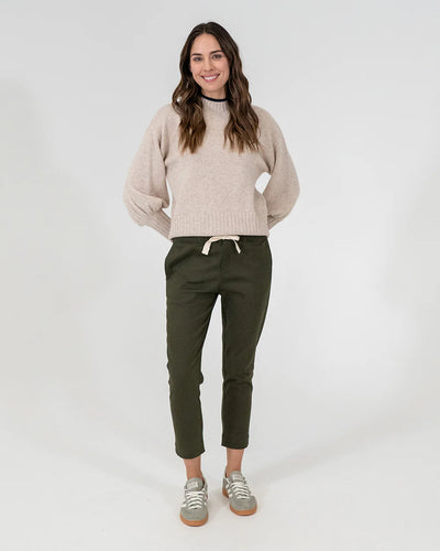 woman wearing Steward Knit - Oatmeal and khaki bottoms