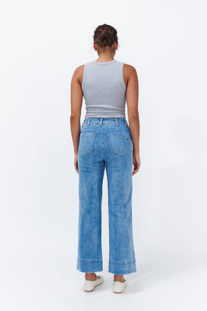 Back view ecom shot of Celeste Pant 70s Blue showing back patch pockets and wide leg silhouette
