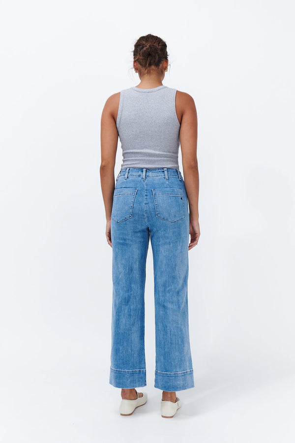 Back view ecom shot of Celeste Pant 70s Blue showing back patch pockets and wide leg silhouette