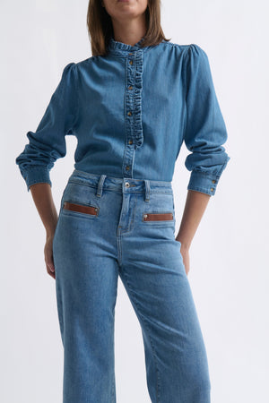 Close-up ecom shot of Freya Jean Leather Pocket 70s Blue highlighting the distinctive PU leather welt pockets