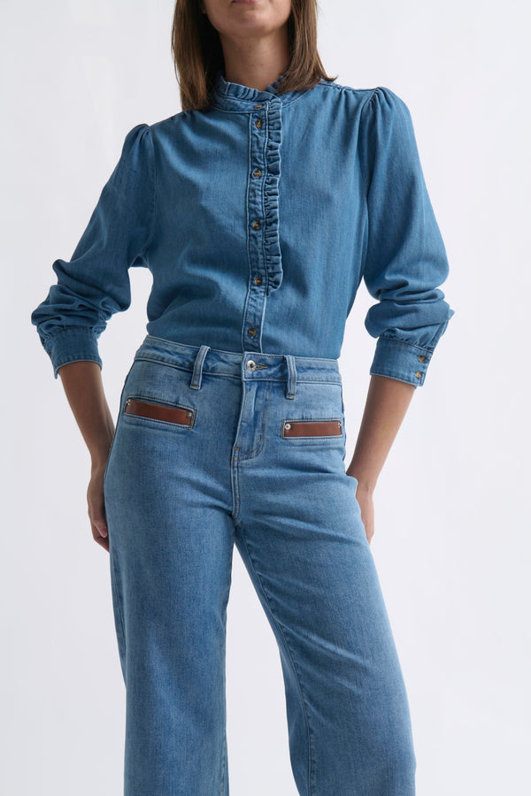 Close-up ecom shot of Freya Jean Leather Pocket 70s Blue highlighting the distinctive PU leather welt pockets