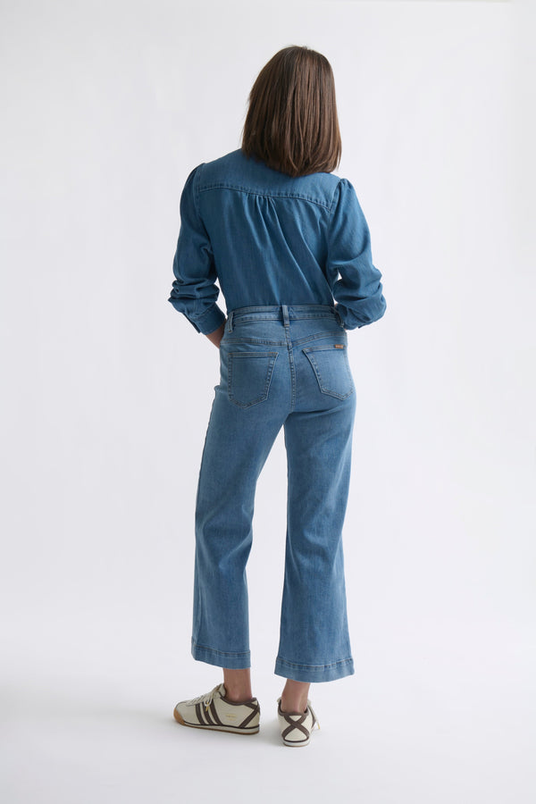 Back view ecom shot of Freya Jean Leather Pocket 70s Blue showing back pockets and wide flared leg silhouette