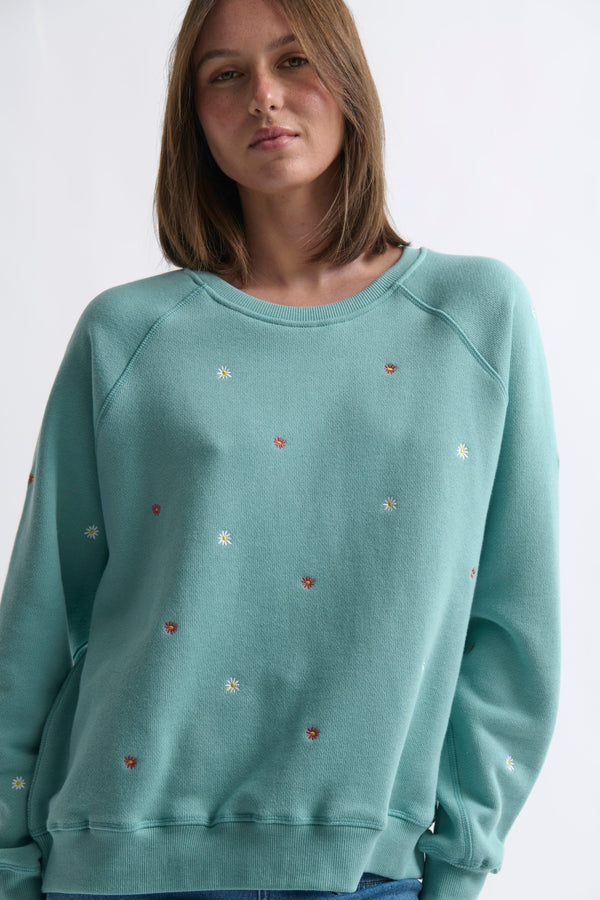 Close-up ecom shot of Patti Sweatshirt Daisy Mint Green highlighting embroidered daisy and floral detail across the front on white background