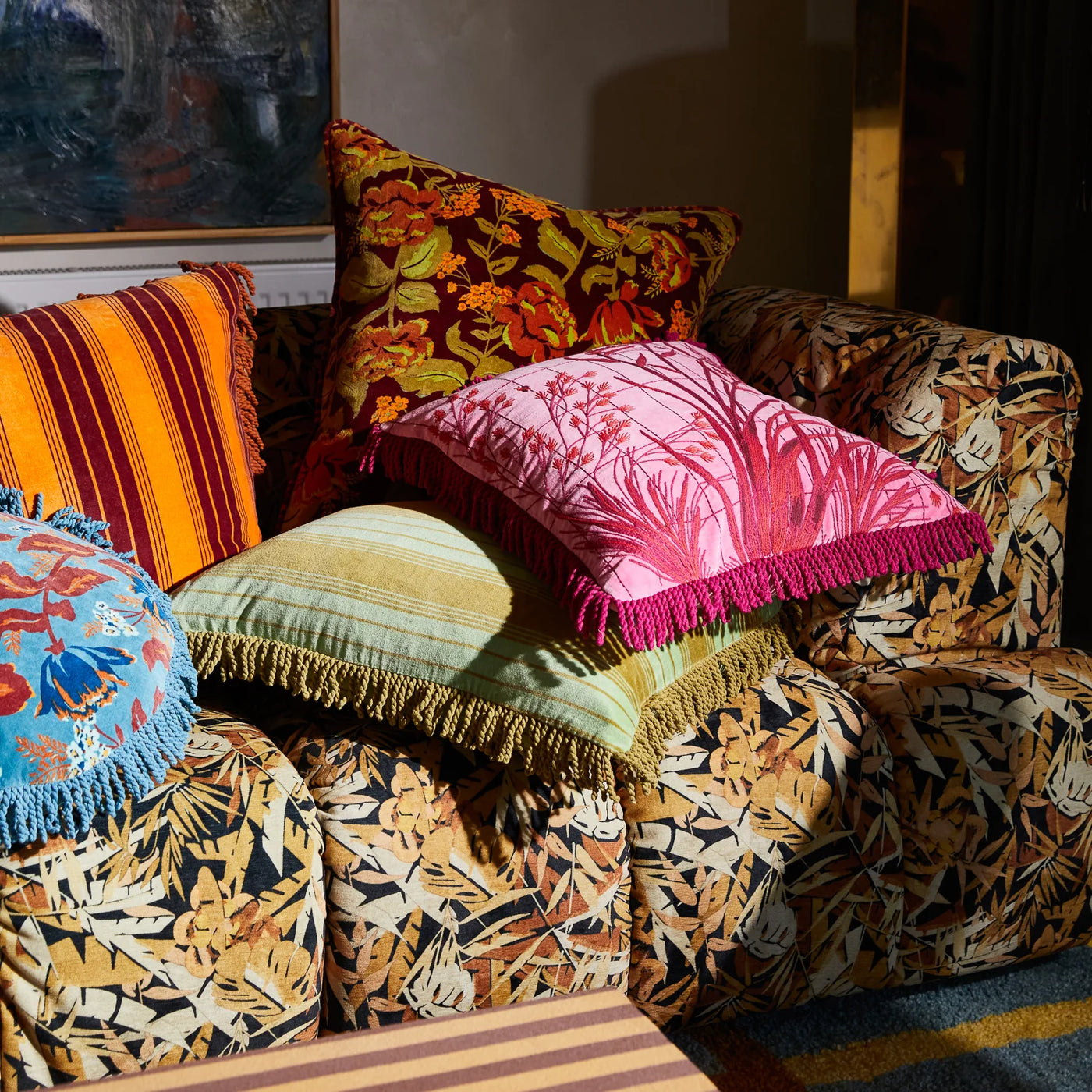sofa with different design of velvet cushion