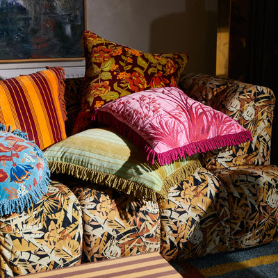 sofa with different design of velvet cushion