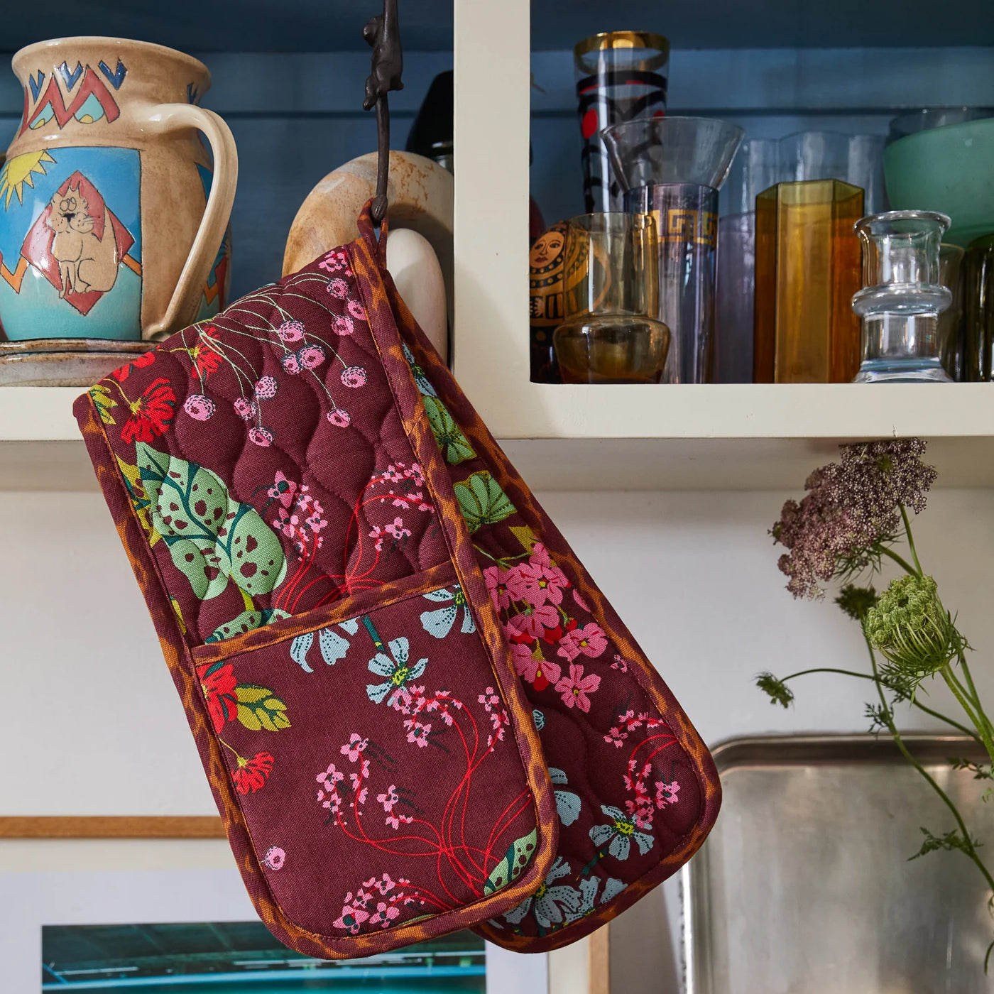 Genevieve Double Oven Mitt hang in the cabinet