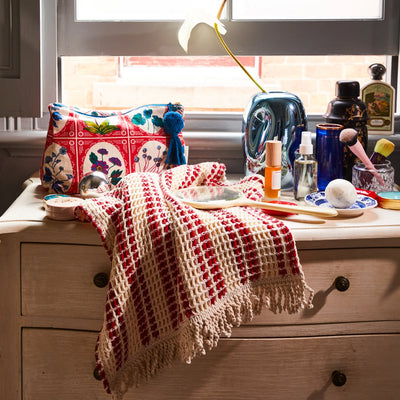 table with mirror, towel and Gigi Cosmetic Bag
