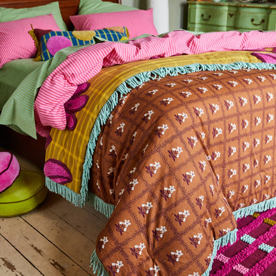 bed with stripe pattern design with Ismay Tufted Bedcover