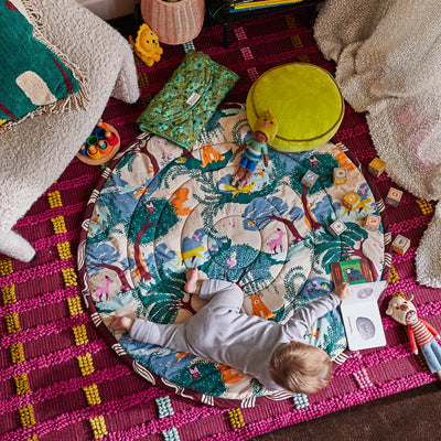 baby playing in Jarvis Play Mat 