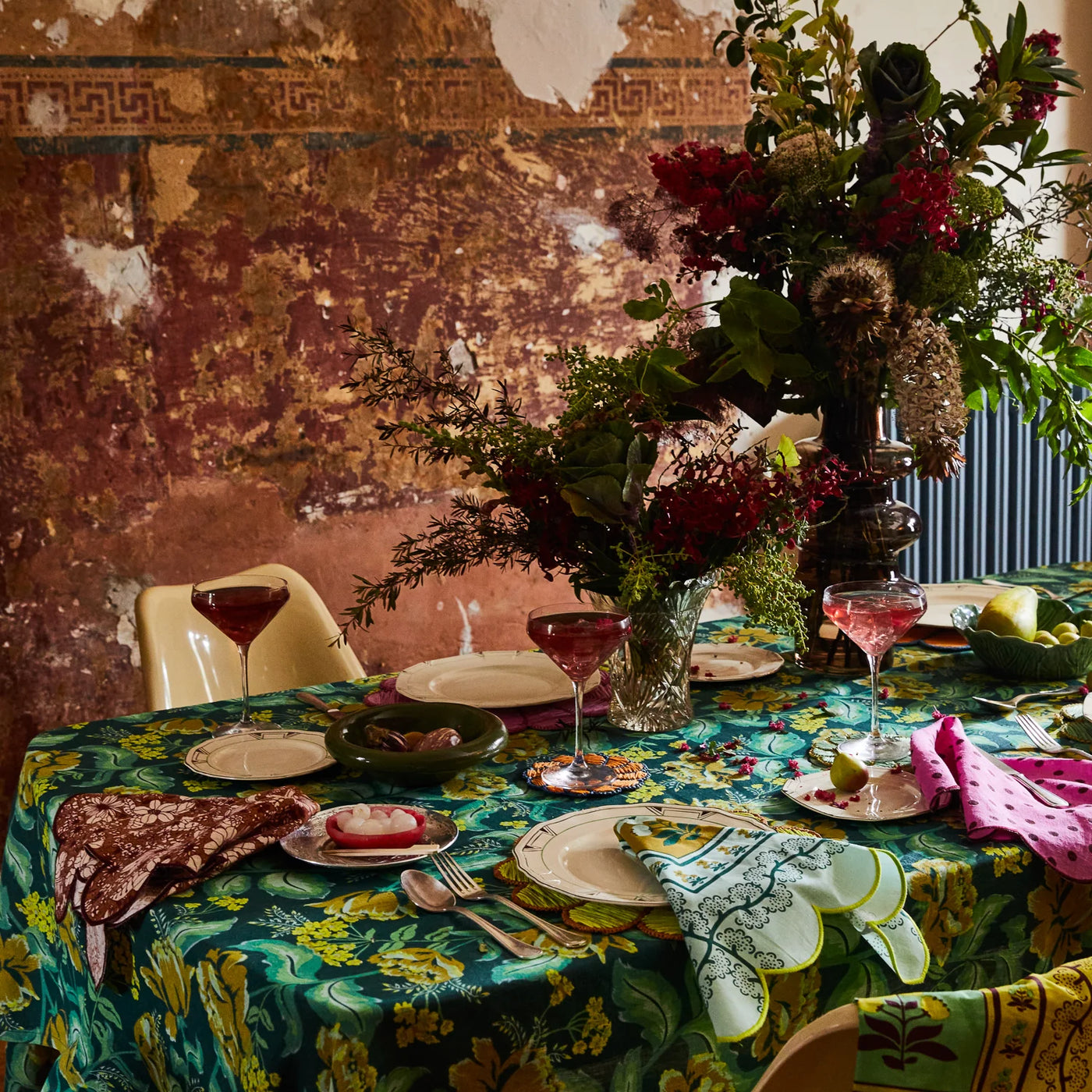 table with Margot Table Cloth in Forest with flower arrangement and plates